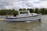 7 мая 2014 года спущен на воду первый представитель нового поколения водоизмещающих катеров СКИФ-23
